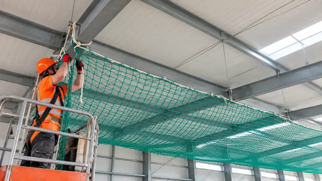 Safety Net Maintenance During Construction Work Safety Net Maintenance During Construction Work Image